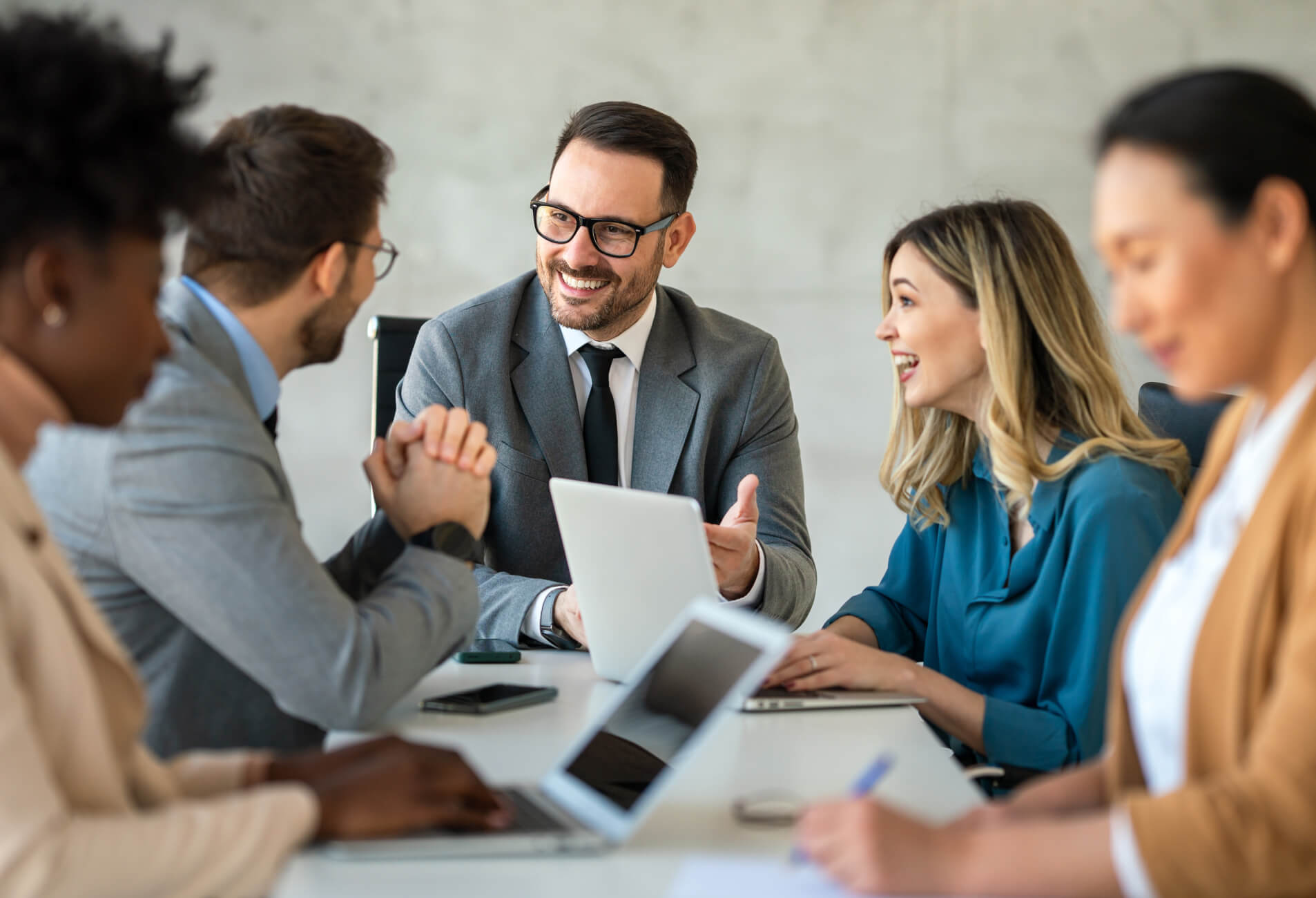 people-happy-faces-while-meeting