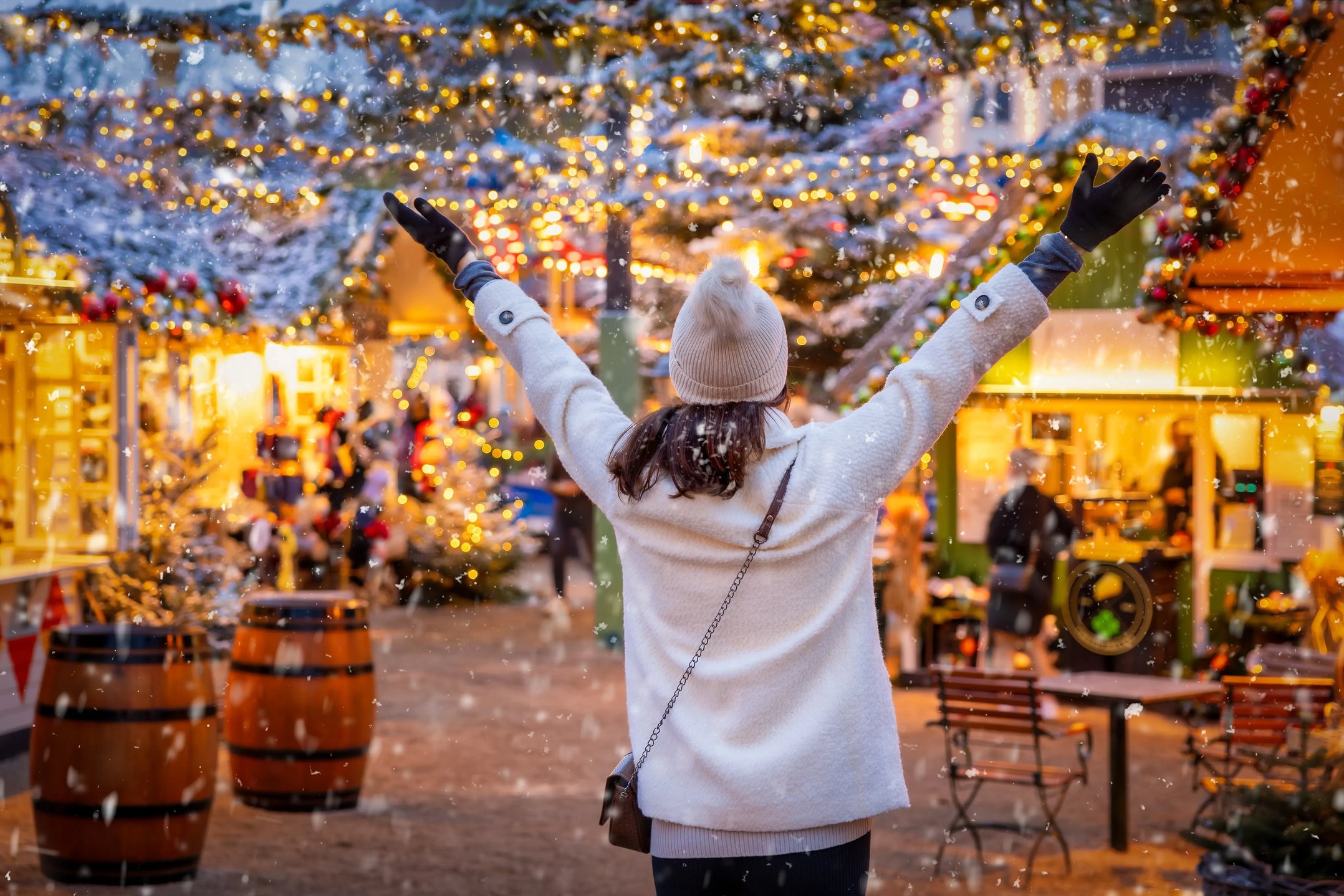 Person at Christmas Market Holiday Shopping - Image by Sven Hansche